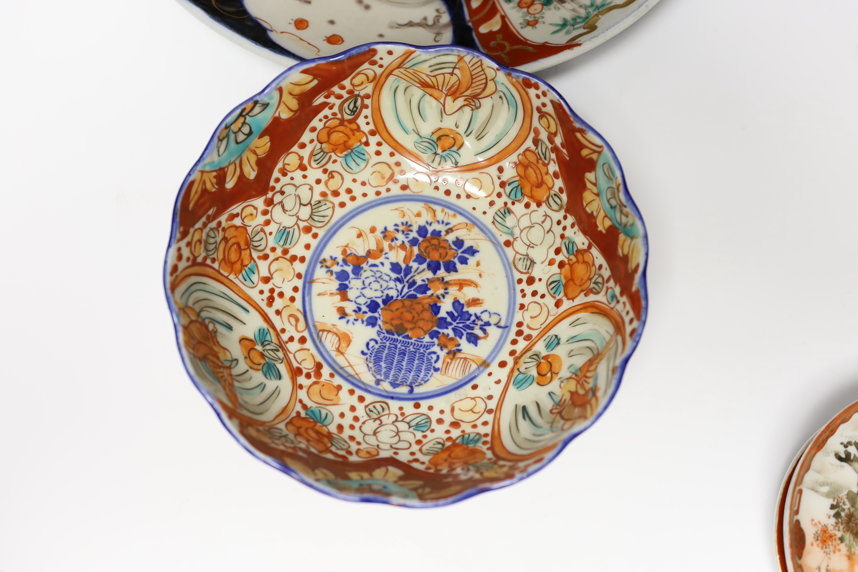 A group of Japanese Imari and kutani together with a Worcester blue and white saucer and a Chinese famille verte teabowl